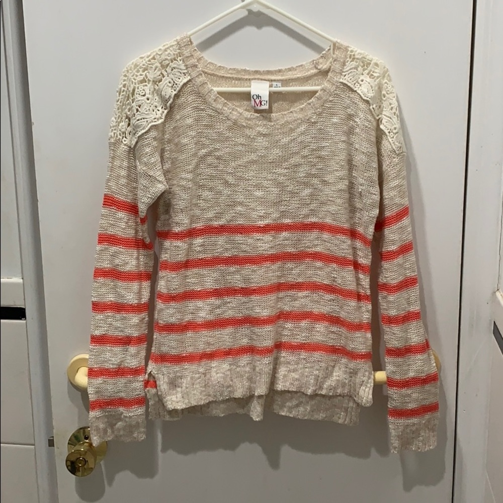 A striped sweater with lace detail